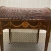 Front view of desk, with tambour fully closed