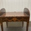 Front view of desk, with tambour open and writing pad laying flat